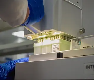 Employee’s of Syngene standing and helping reduce consumption of solvents and waste generated.
                